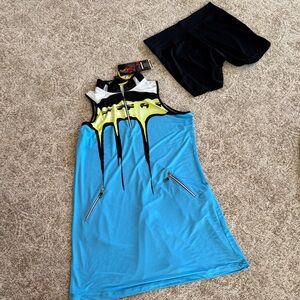 Jamie Sadock blue and yellow golf dress with shorts.